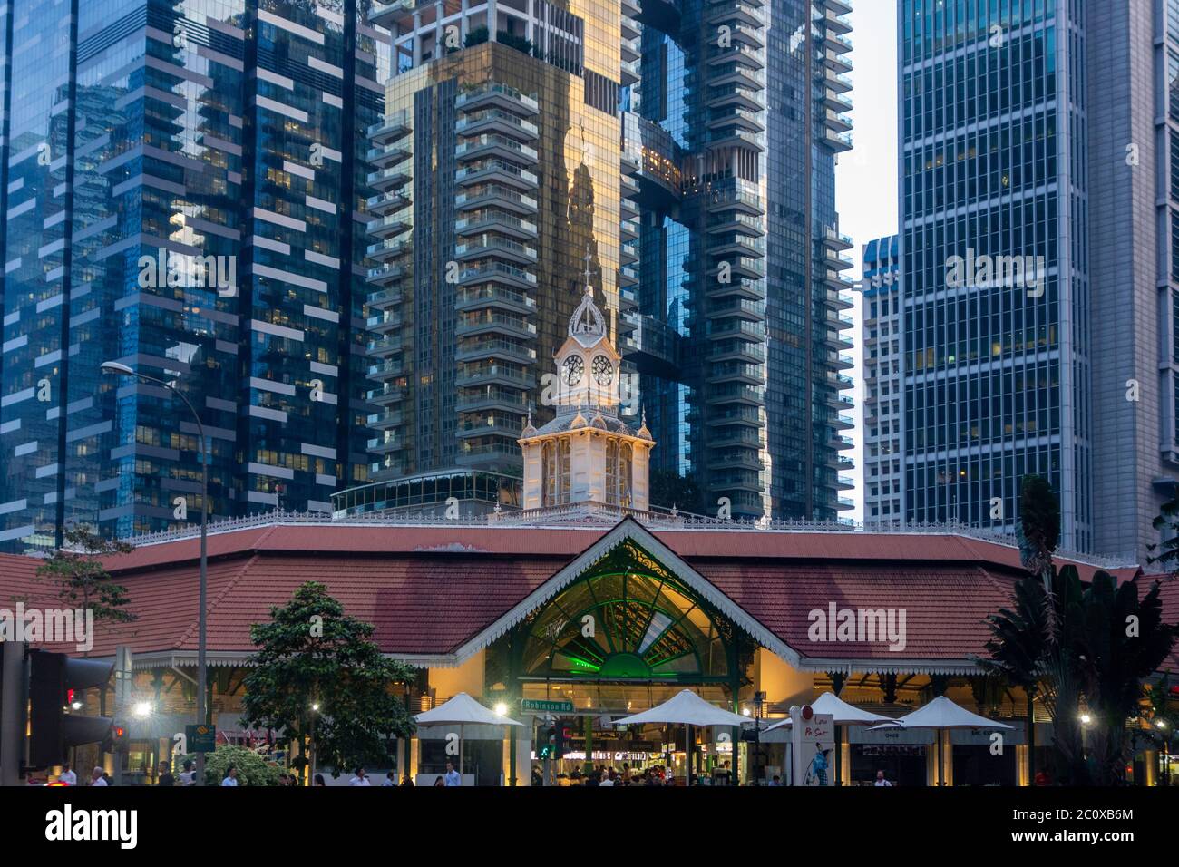 Main entrance of Telok Ayer Market (Lau Pa Sat) and Downtown buildings at the background. Central Area. Singapore Stock Photo