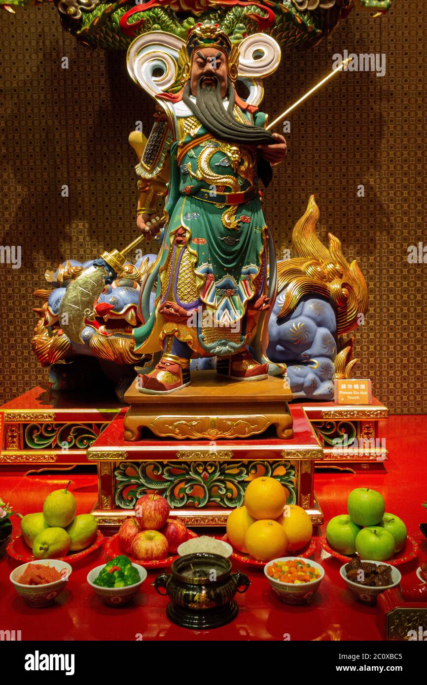 Deity Statue At Buddha Tooth Relic Temple. Chinatown. Singapore Stock 