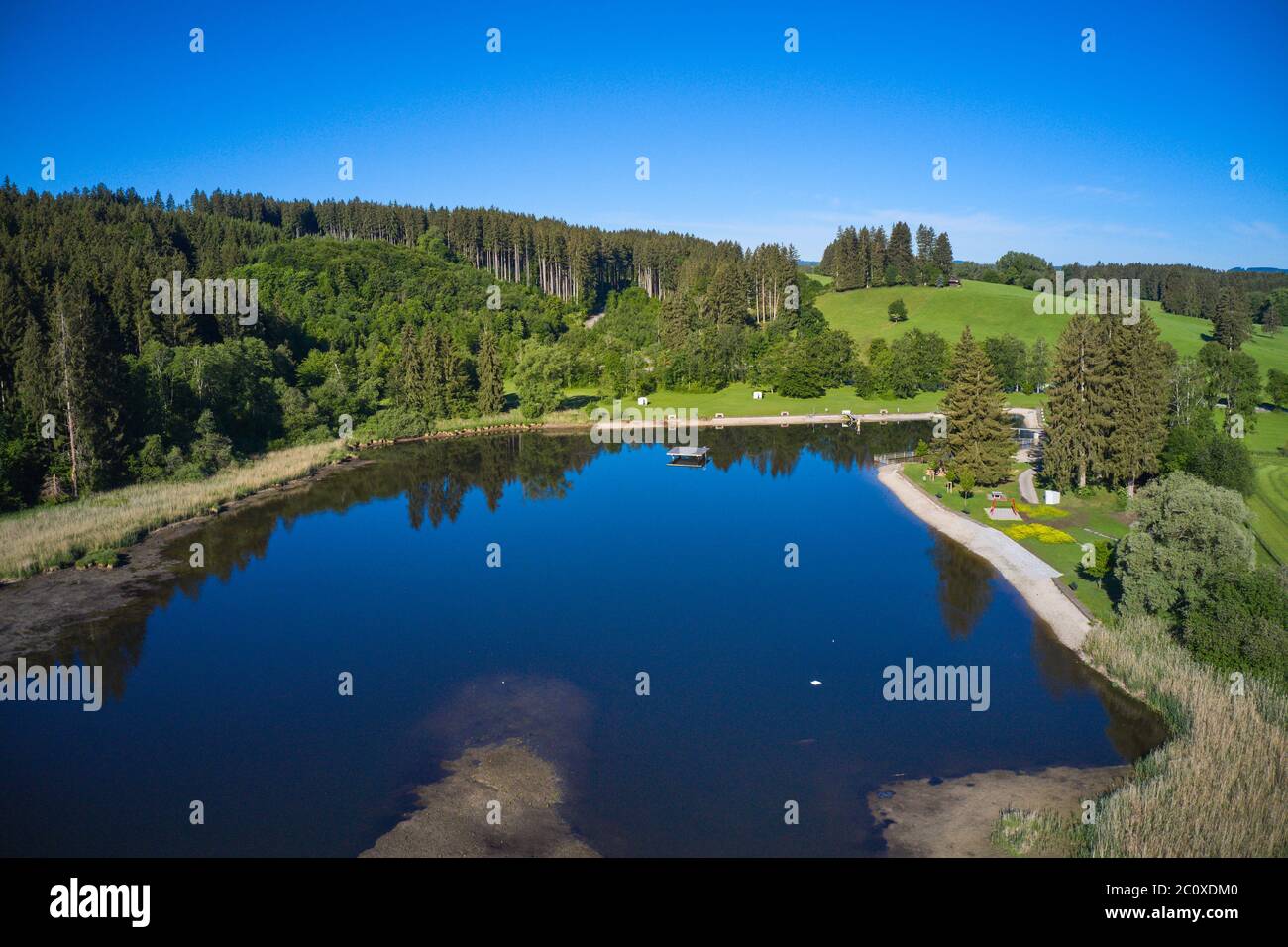 Marktoberdorf, Germany, 12th June 2020  Ettwieser Weiher, a small lake for relax and swimming. © Peter Schatz / Alamy Stock Photos Stock Photo