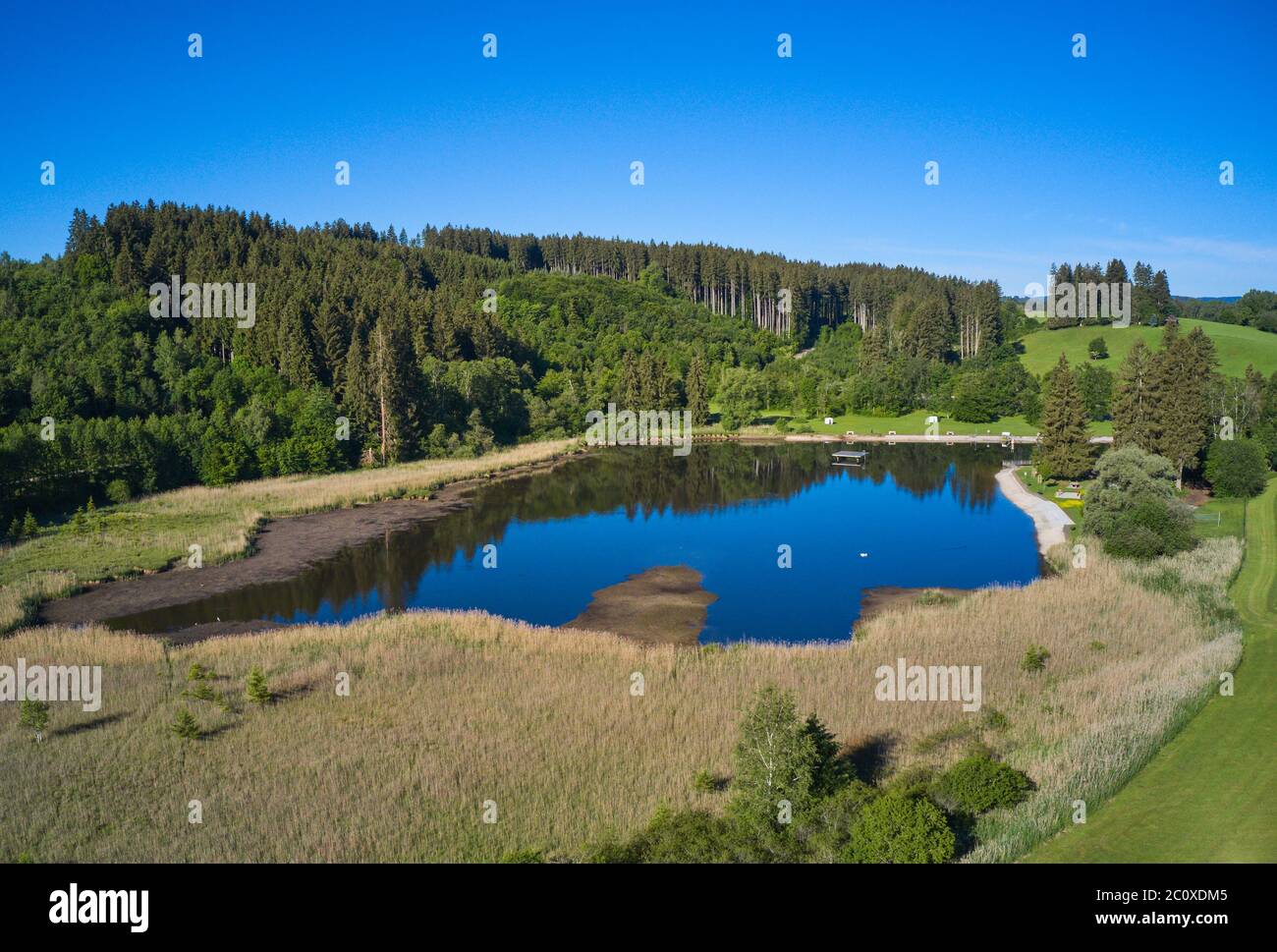 Marktoberdorf, Germany, 12th June 2020  Ettwieser Weiher, a small lake for relax and swimming. © Peter Schatz / Alamy Stock Photos Stock Photo