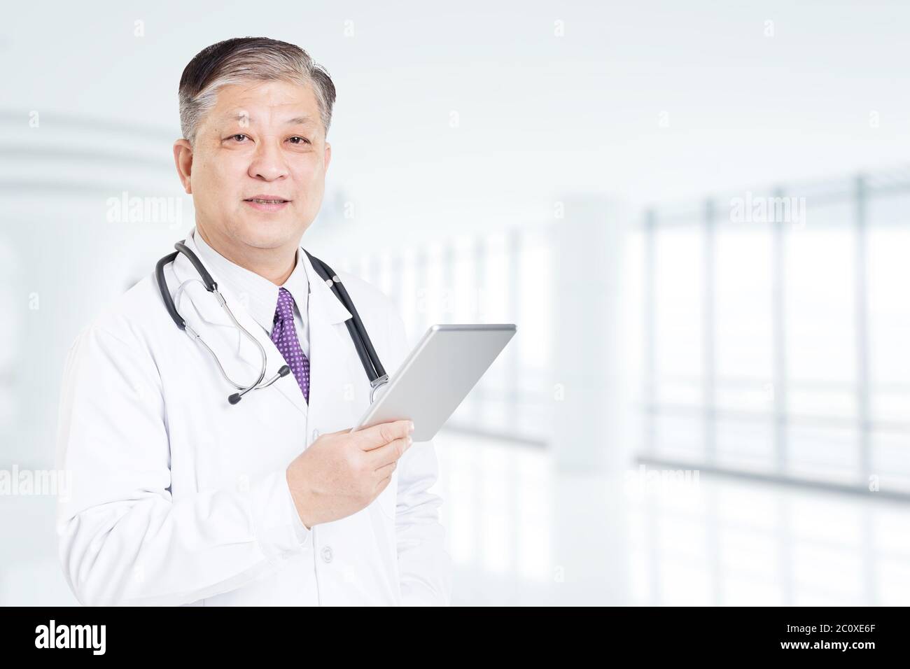 Old white male doctor in hi-res stock photography and images - Alamy