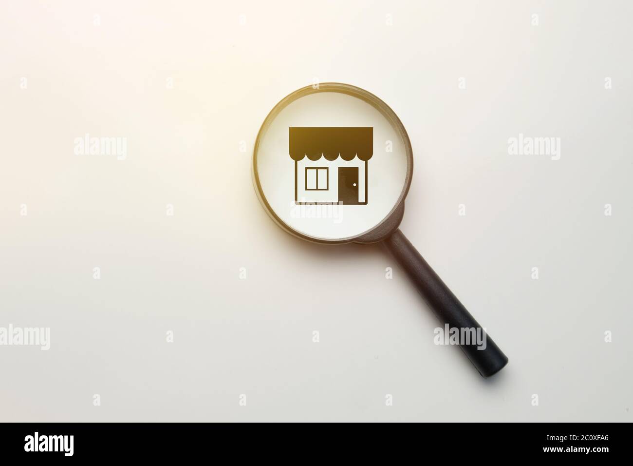 Magnifier store search concept white background with icon Stock Photo ...