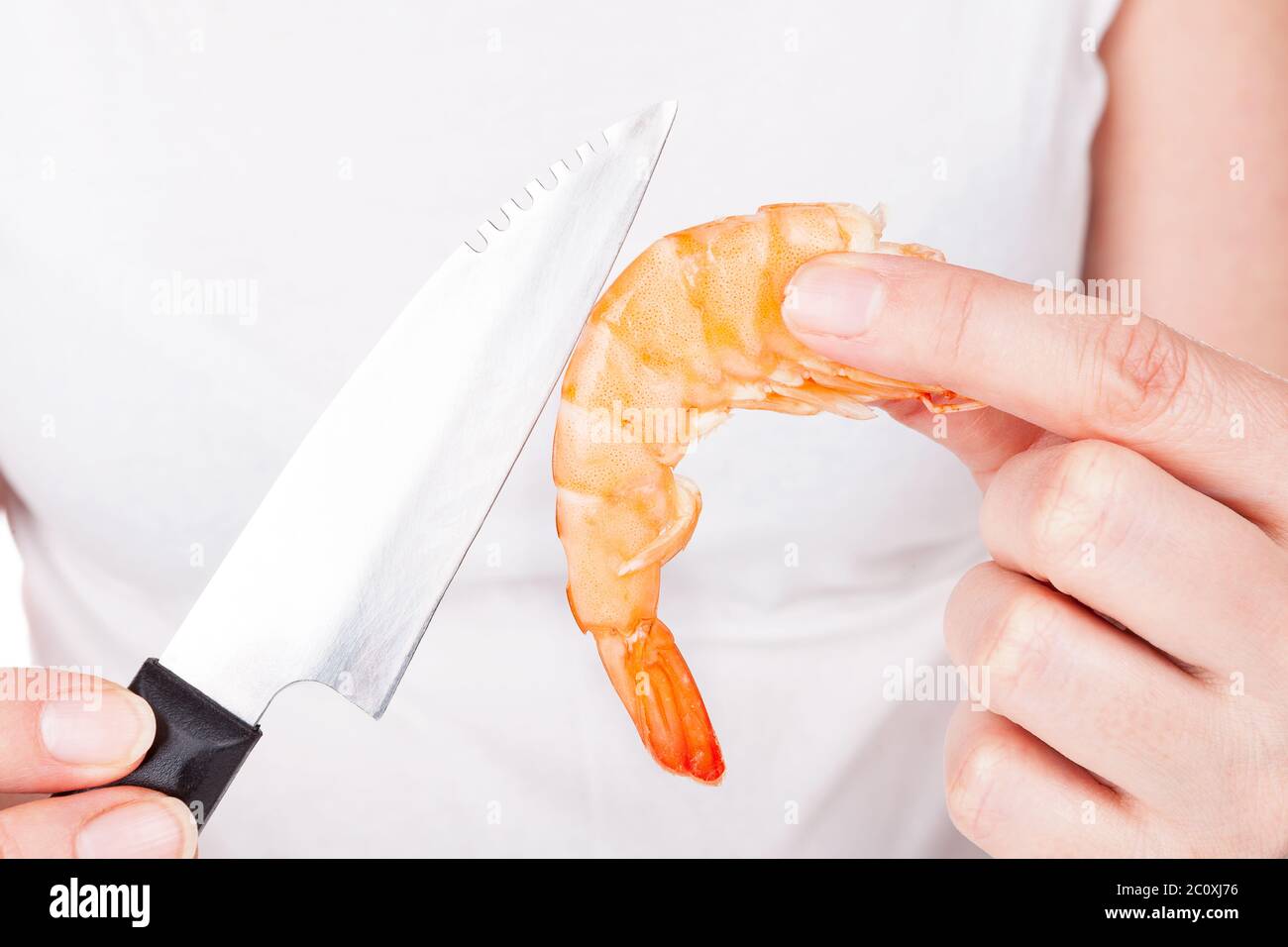 Preparing a shrimp Stock Photo - Alamy