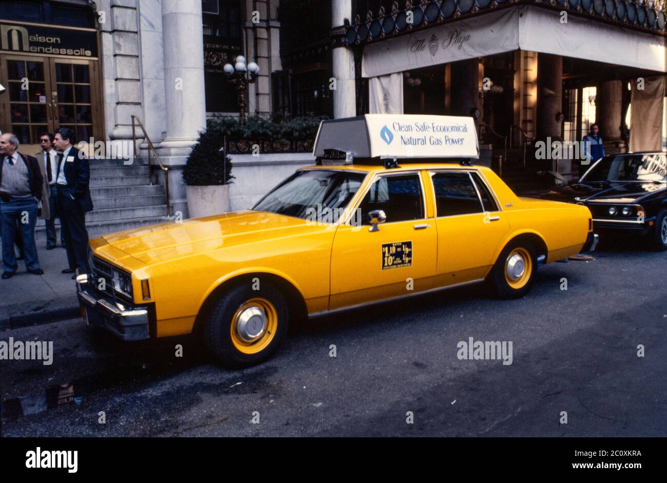 Taxi Cab in front of Plaza Hotel 1980's Stock Photo