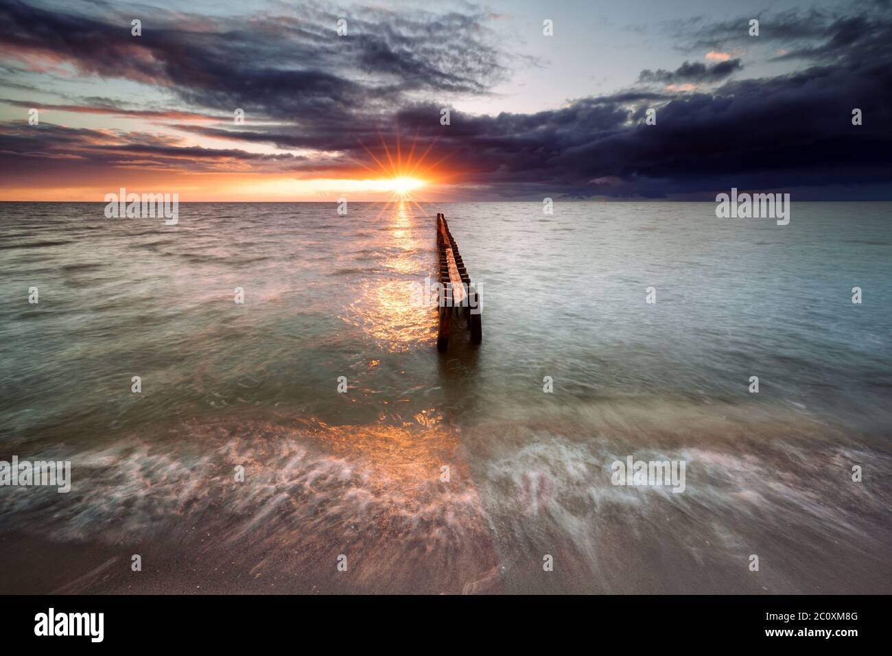 sundown on Ijsselmeer beach Stock Photo
