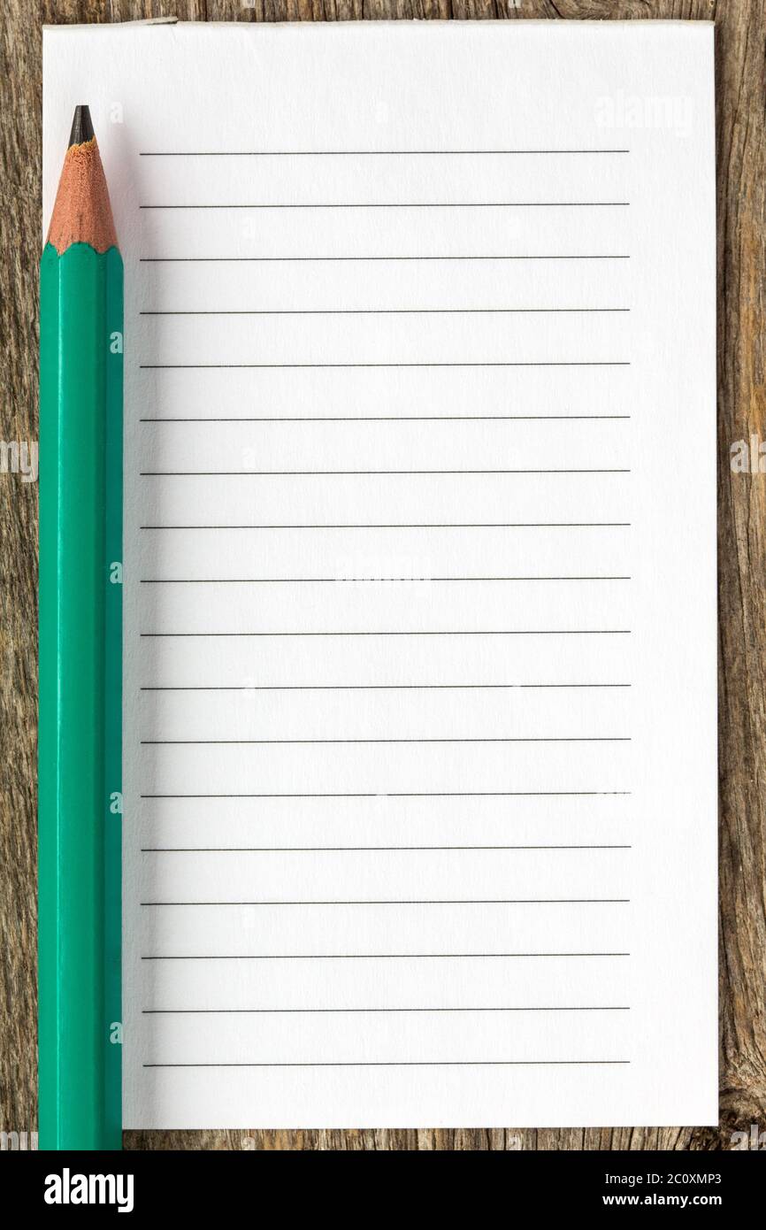 Pencil and blank lined paper Stock Photo Alamy