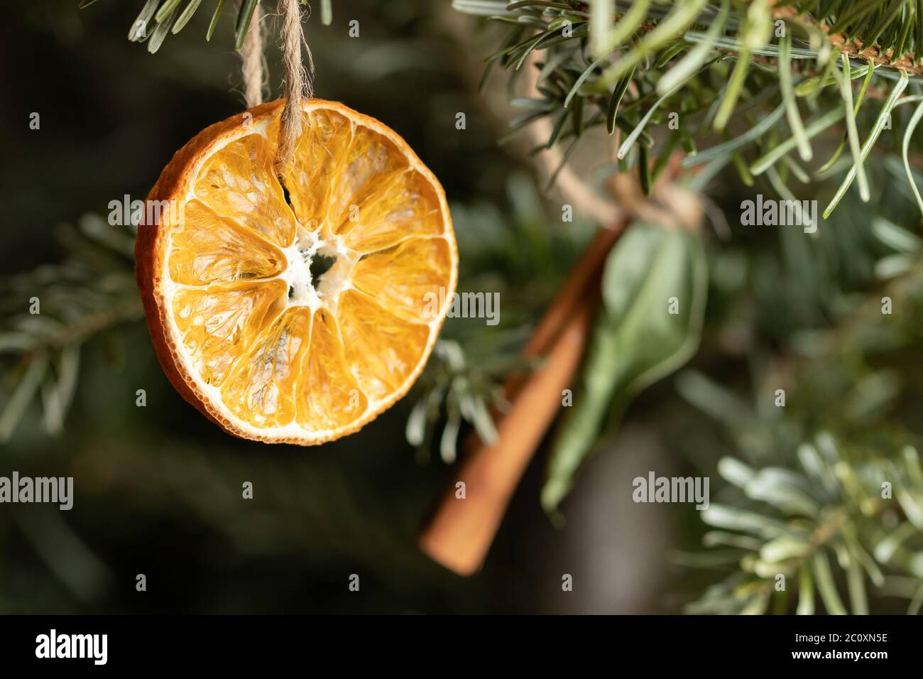 Premium Photo  Christmas, new year holiday cooking . ingredients, spices,  dried oranges and baking molds, christmas decorations (balls, fir-tree  branch, cones), on black stone table, copyspace top view