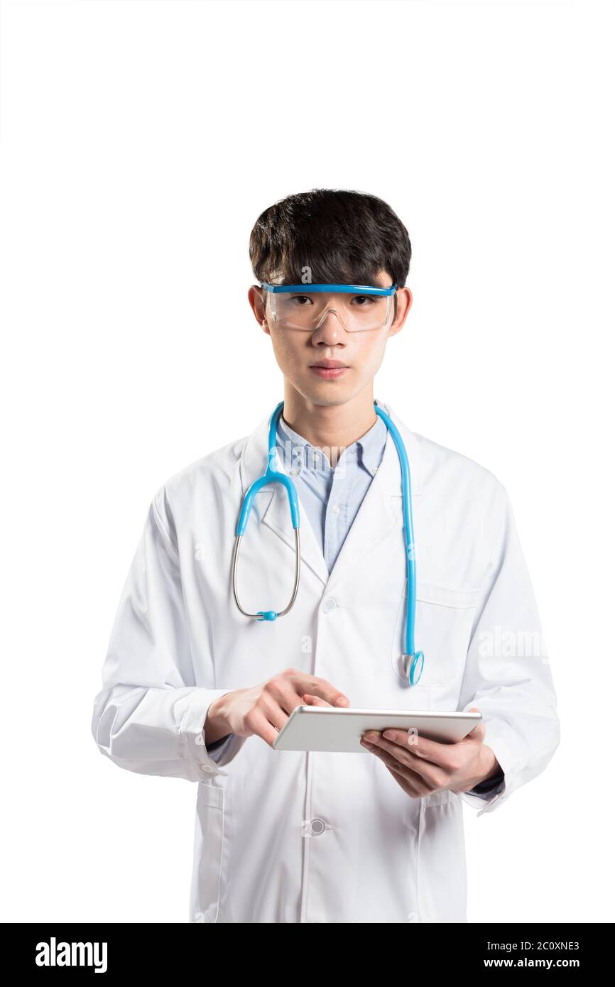isolated young asian man doctor on white background Stock Photo