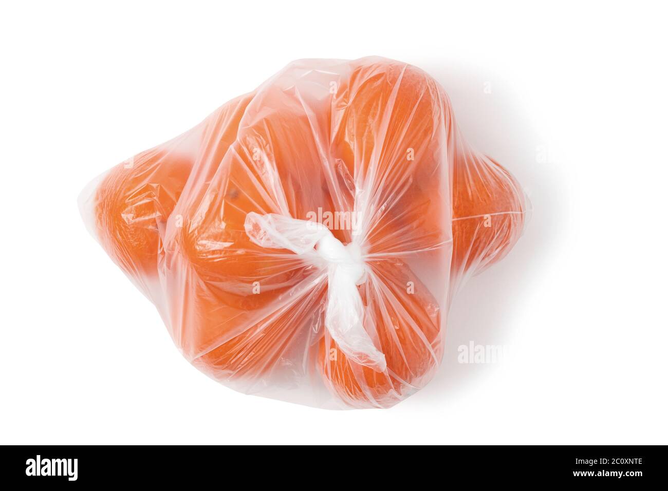 Several tangerines in a package isolated on a white background with clipping paths with and without shadow, top view Stock Photo