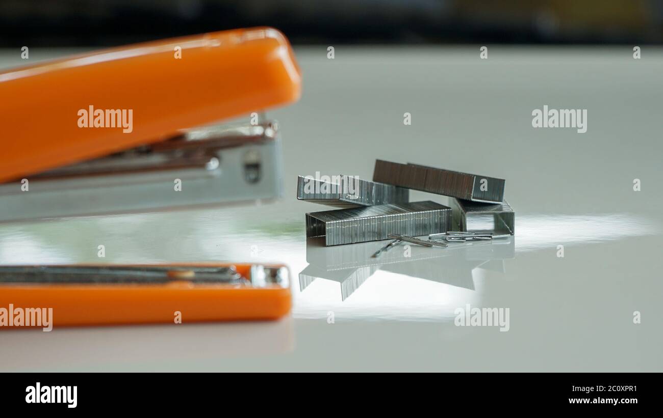 Close up the stapler on the table Stock Photo