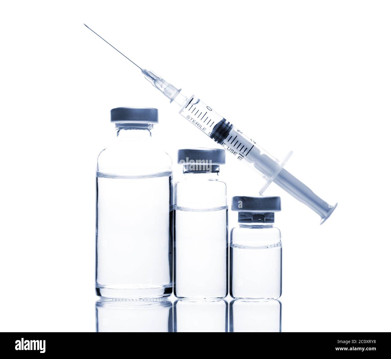 Glass Medicine Vials and Syringe on white background Stock Photo