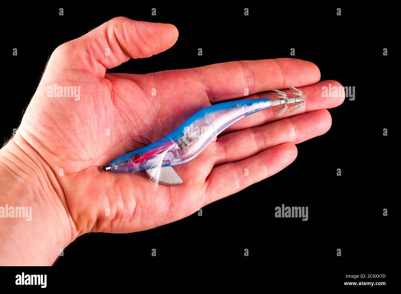 A selection of squid jigs, or lures. Squid fishing has become popular in  the UK both for commercial fishermen as well as recreational anglers. The  lur Stock Photo - Alamy