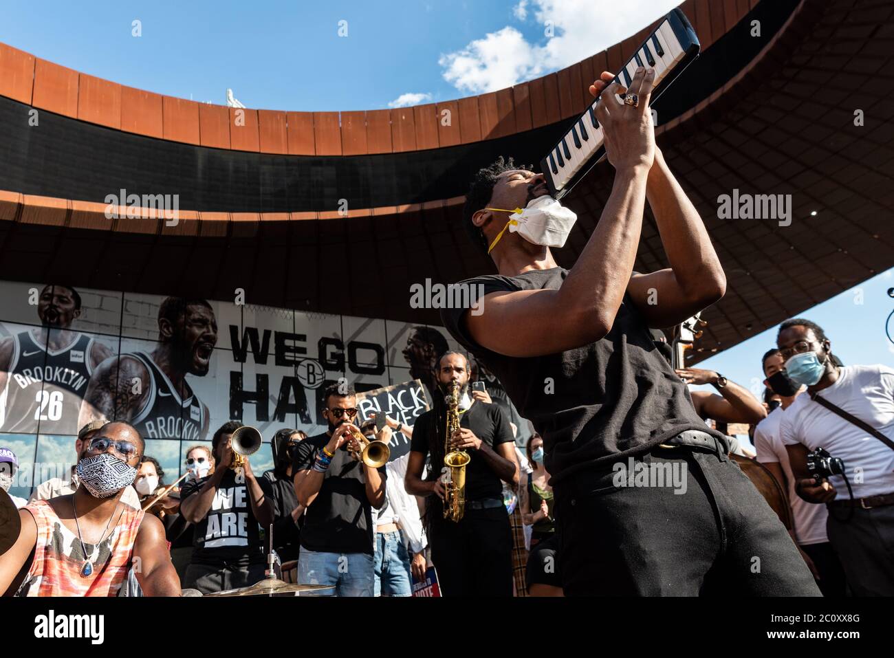Brooklyn, United States Of America . 12th June, 2020. Entering the third week of protests after the death of George Floyd, Jon Batiste and his band 'Stay Human' play at the Barclays Center calling for racial justice on June 12, 2020, in Brooklyn, New York. (Photo by Gabriele Holtermann/Sipa) Credit: Sipa USA/Alamy Live News Stock Photo