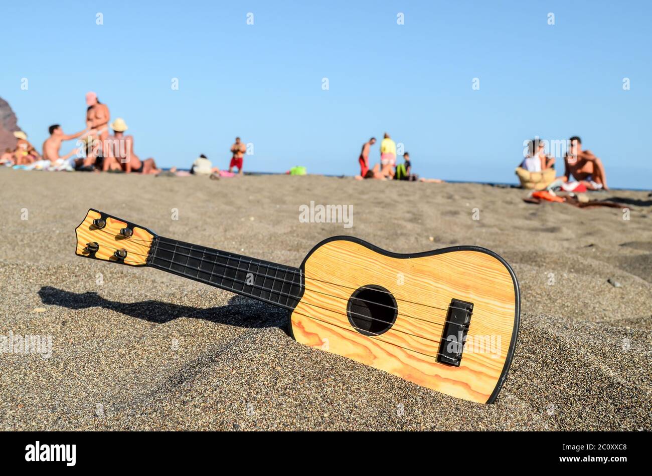 Beach Instruments Guitar on the Sand Beach Stock Photo - Alamy