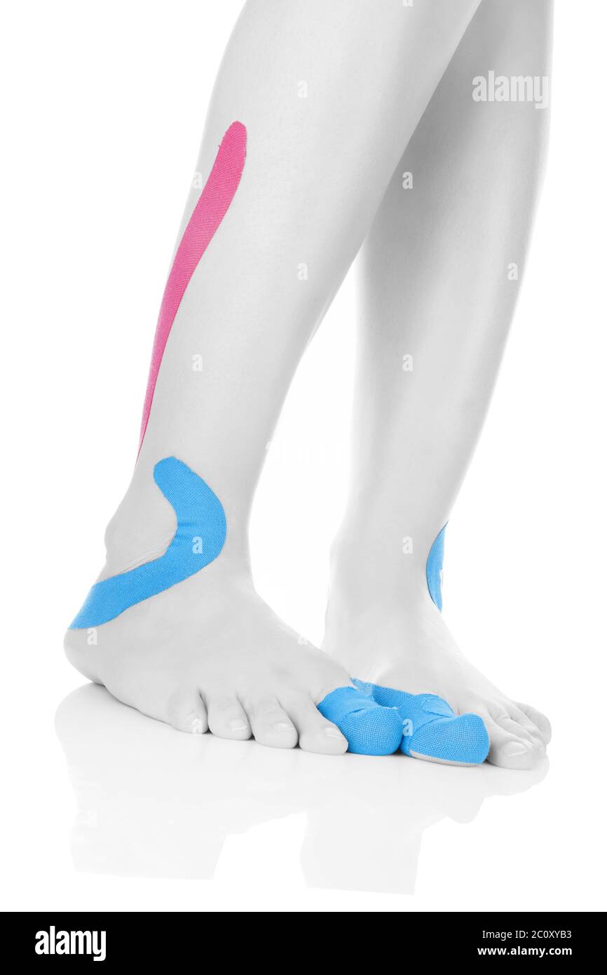 Therapeutic tape on female feet Stock Photo Alamy