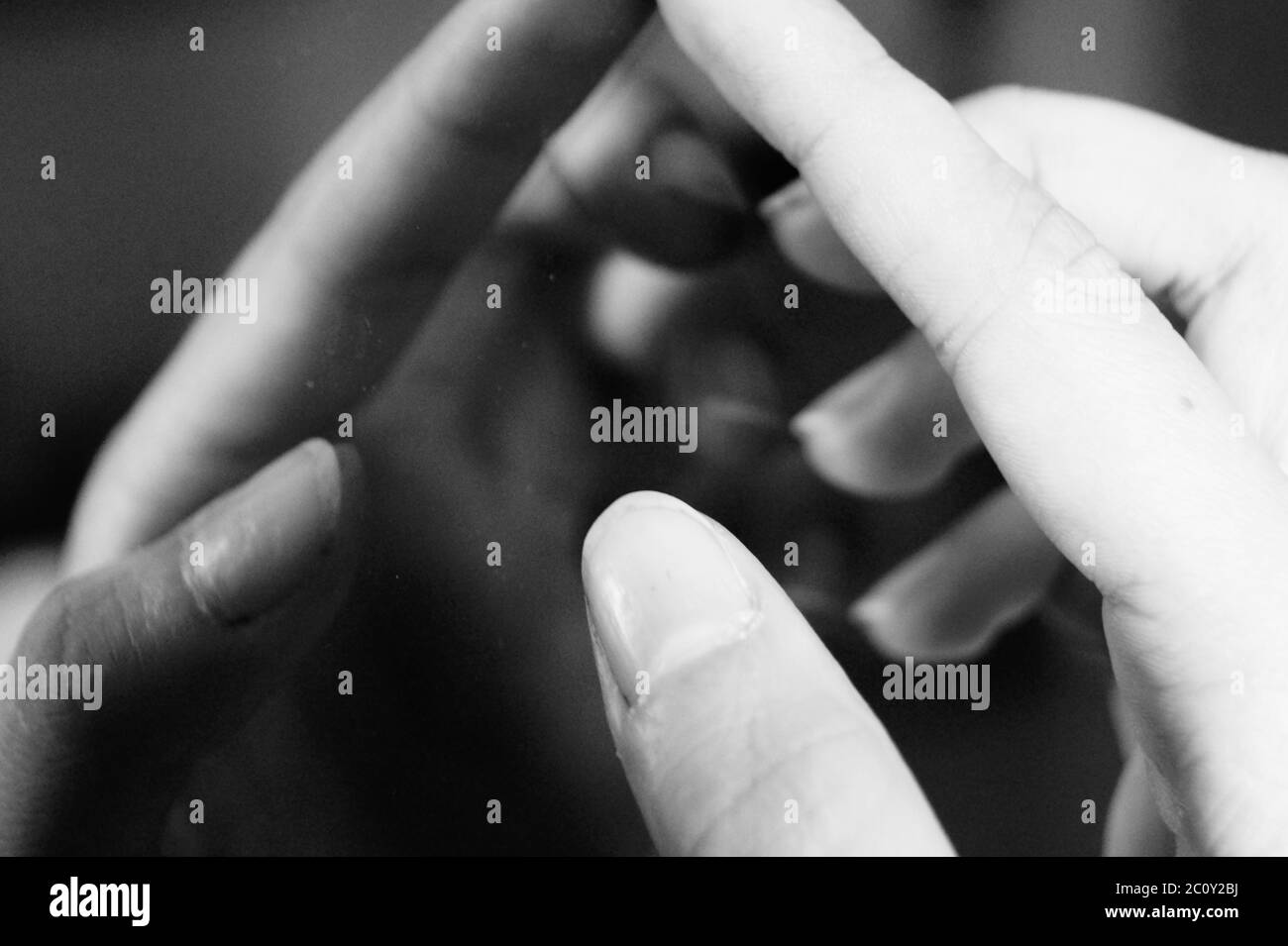 A close up of hand, black and white soul sad emo mirror Stock Photo