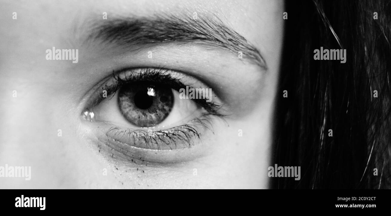 A close up of eyes, black and white soul sad Stock Photo - Alamy
