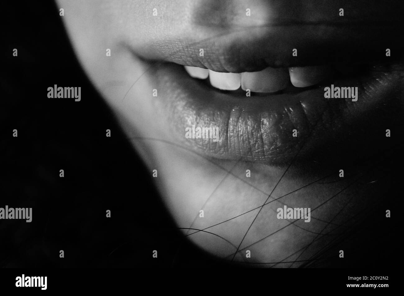 A close up of mouth, black and white soul sad emo  Stock Photo