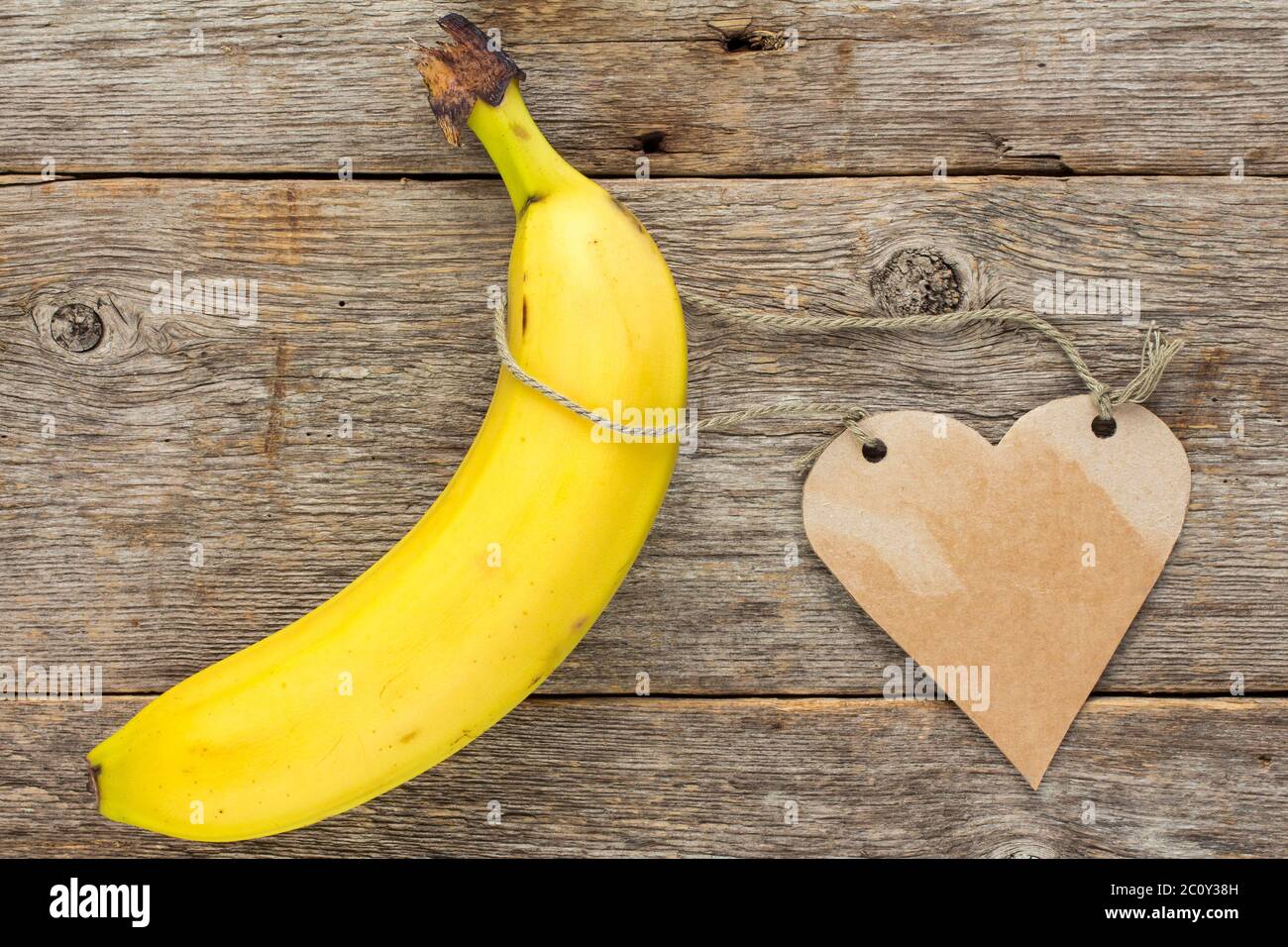 Fresh banana fruit with heart shaped tag Stock Photo