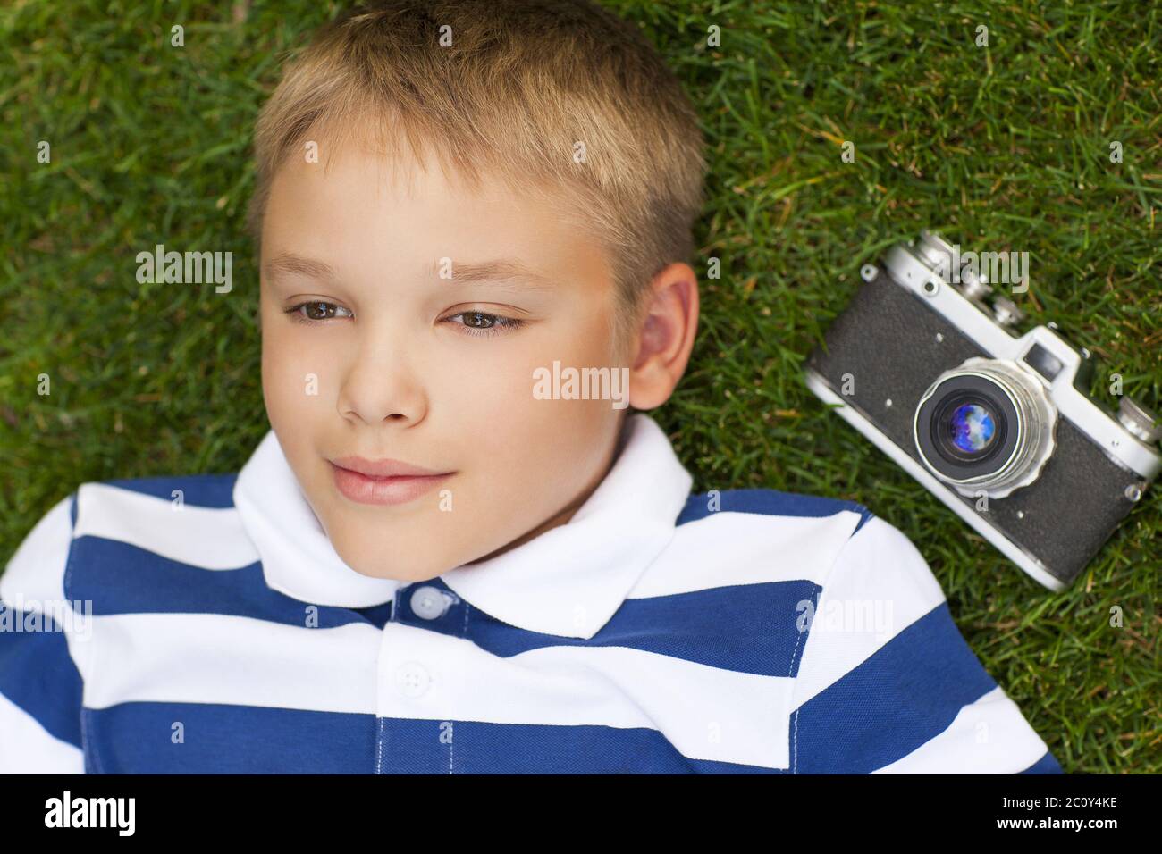 Preteen boy smiling camera hi-res stock photography and images - Alamy