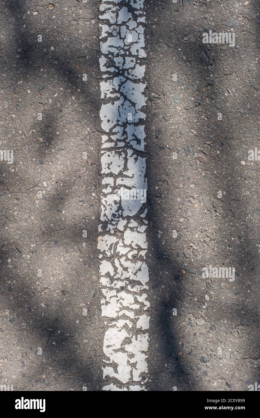 Asphalt highway texture with cracked stripe Stock Photo
