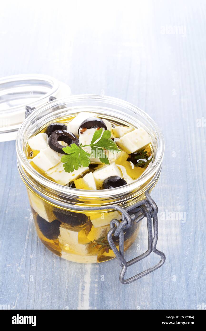 Marinated greek feta cheese Stock Photo Alamy