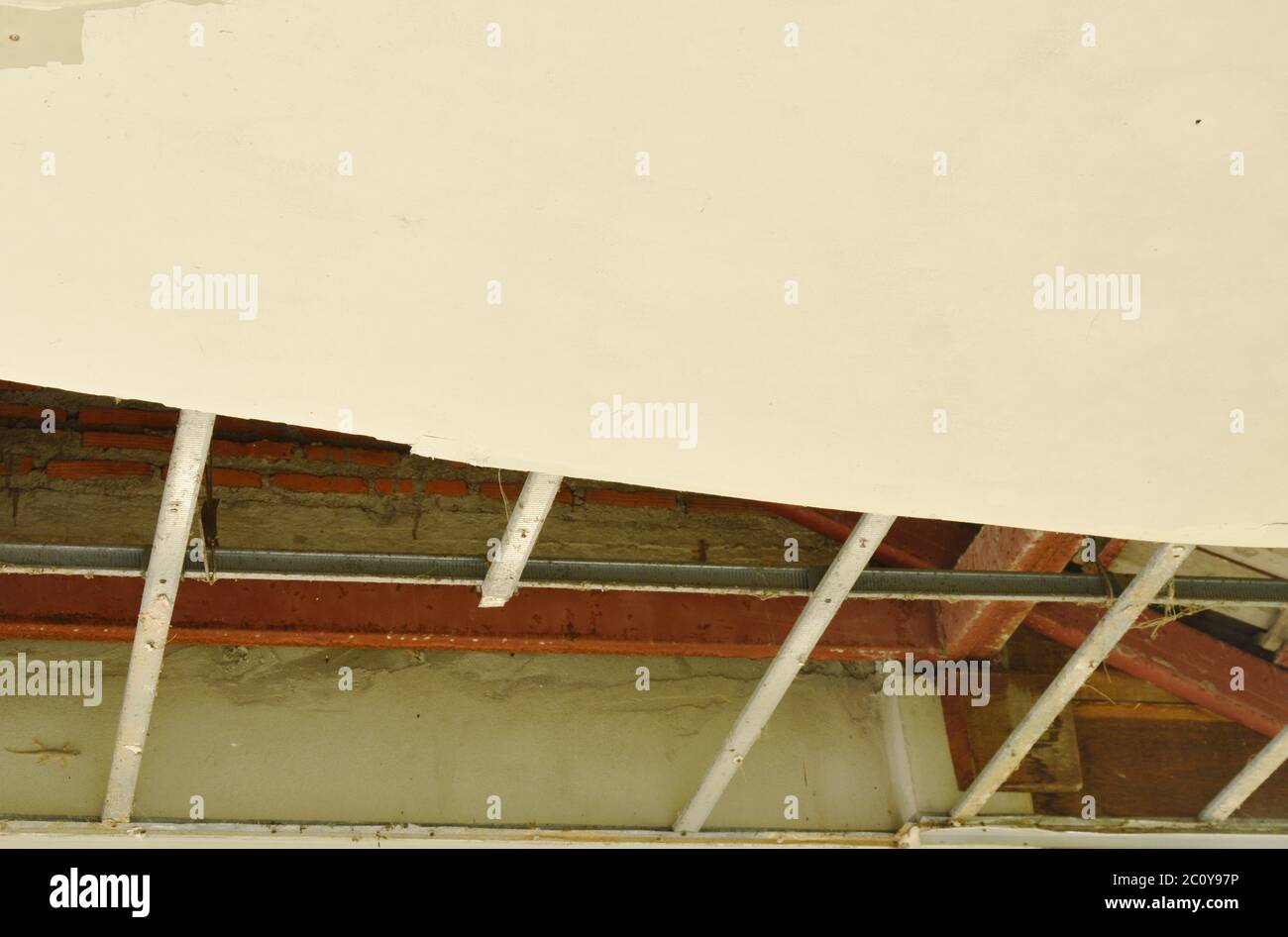 broken and damage home ceiling falling down to ground Stock Photo Alamy