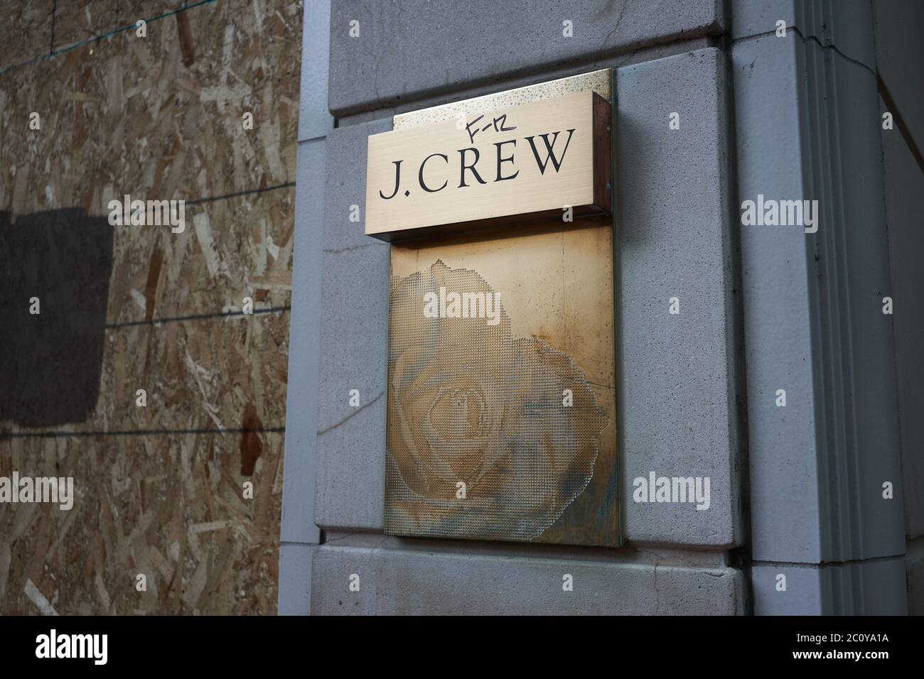 The J.Crew sign is seen outside the boarded-up J.Crew store in downtown Portland's Pioneer Place, on Friday, Jun 12, 2020, amid the ongoing protest. Stock Photo