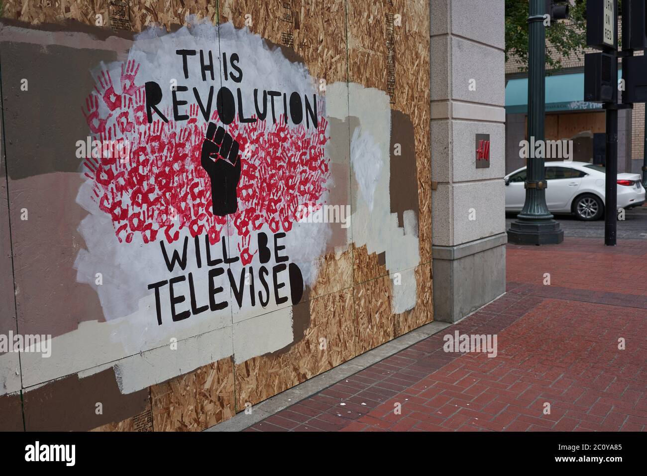 The boarded-up H&M store in downtown Portland, Oregon, which has become canvases for protest, seen on Friday, Jun 12, 2020. Stock Photo