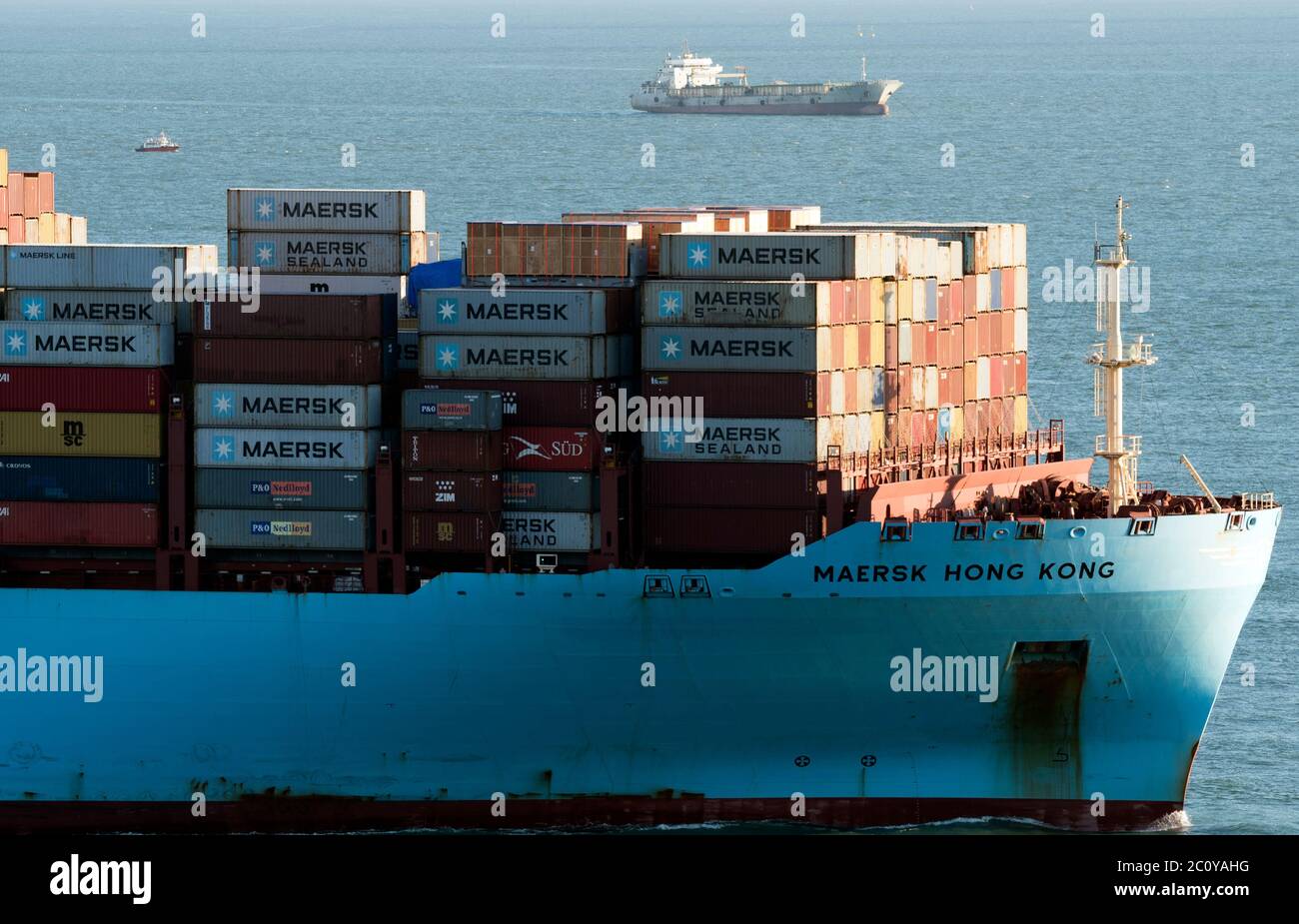 Container ships transporting cargo into Hong Kong from mainland China