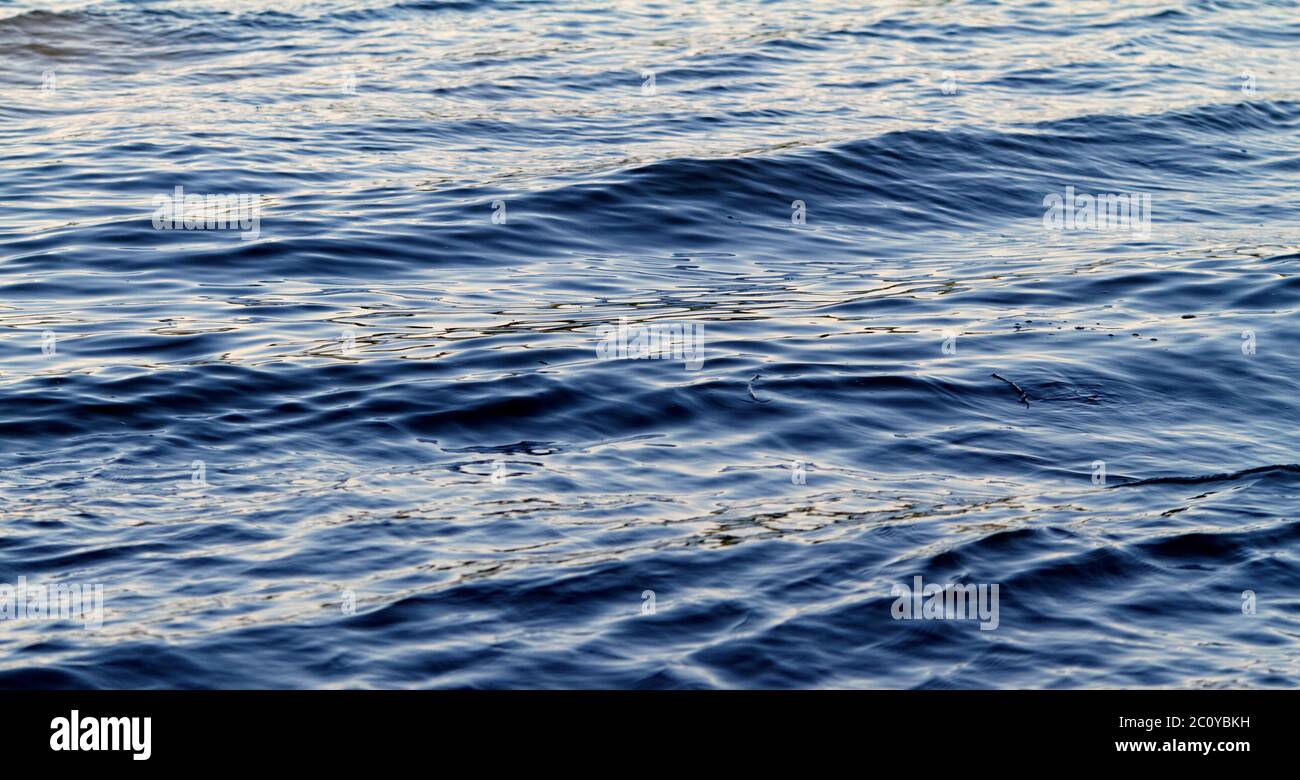 Photo of blue water background with ripples Stock Photo - Alamy