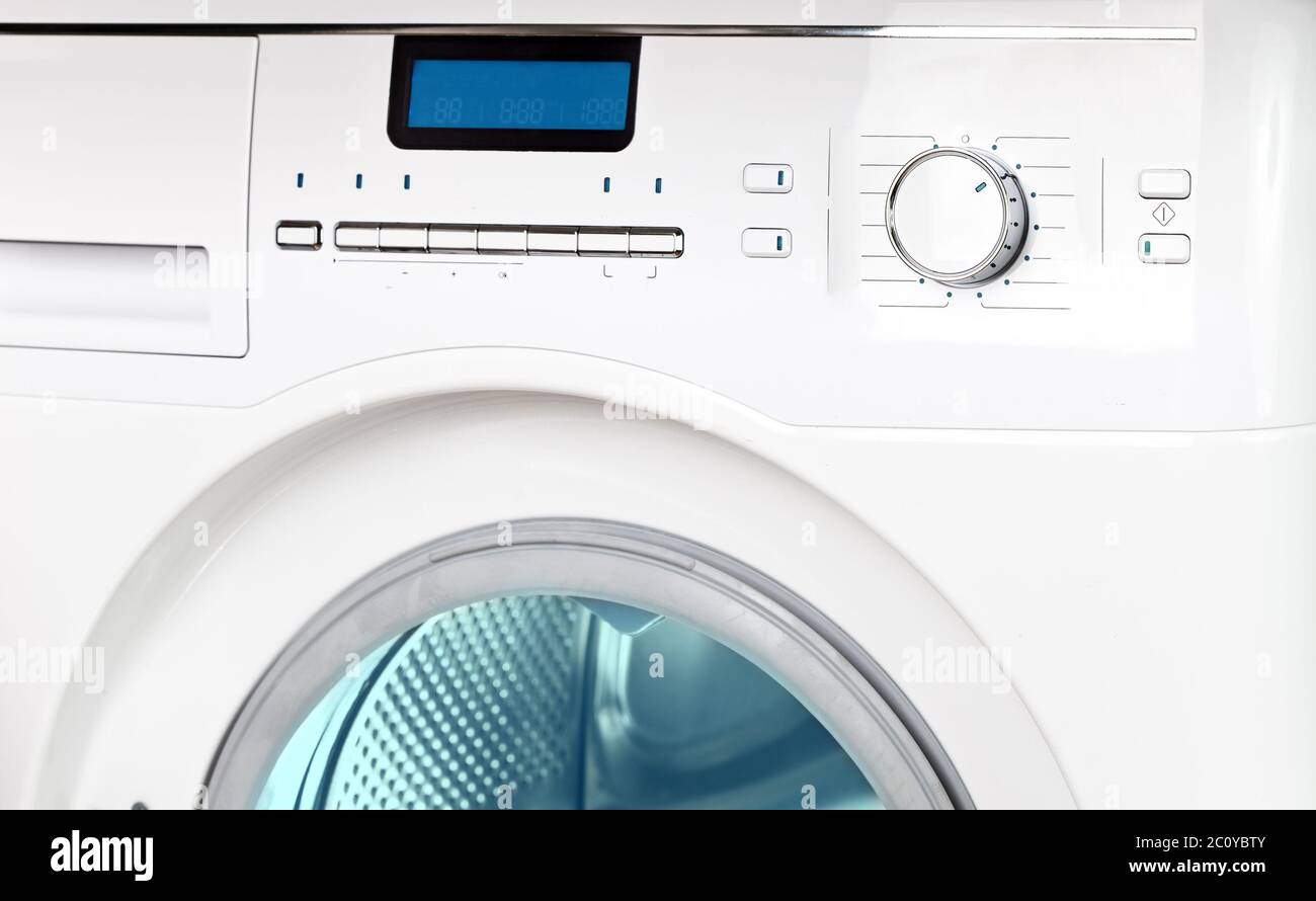 washing machine - a close up of the display, the manhole and a choice of programs Stock Photo