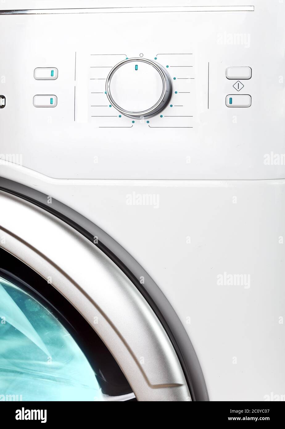 washing machine - a close up of the display, the manhole and a choice of programs Stock Photo