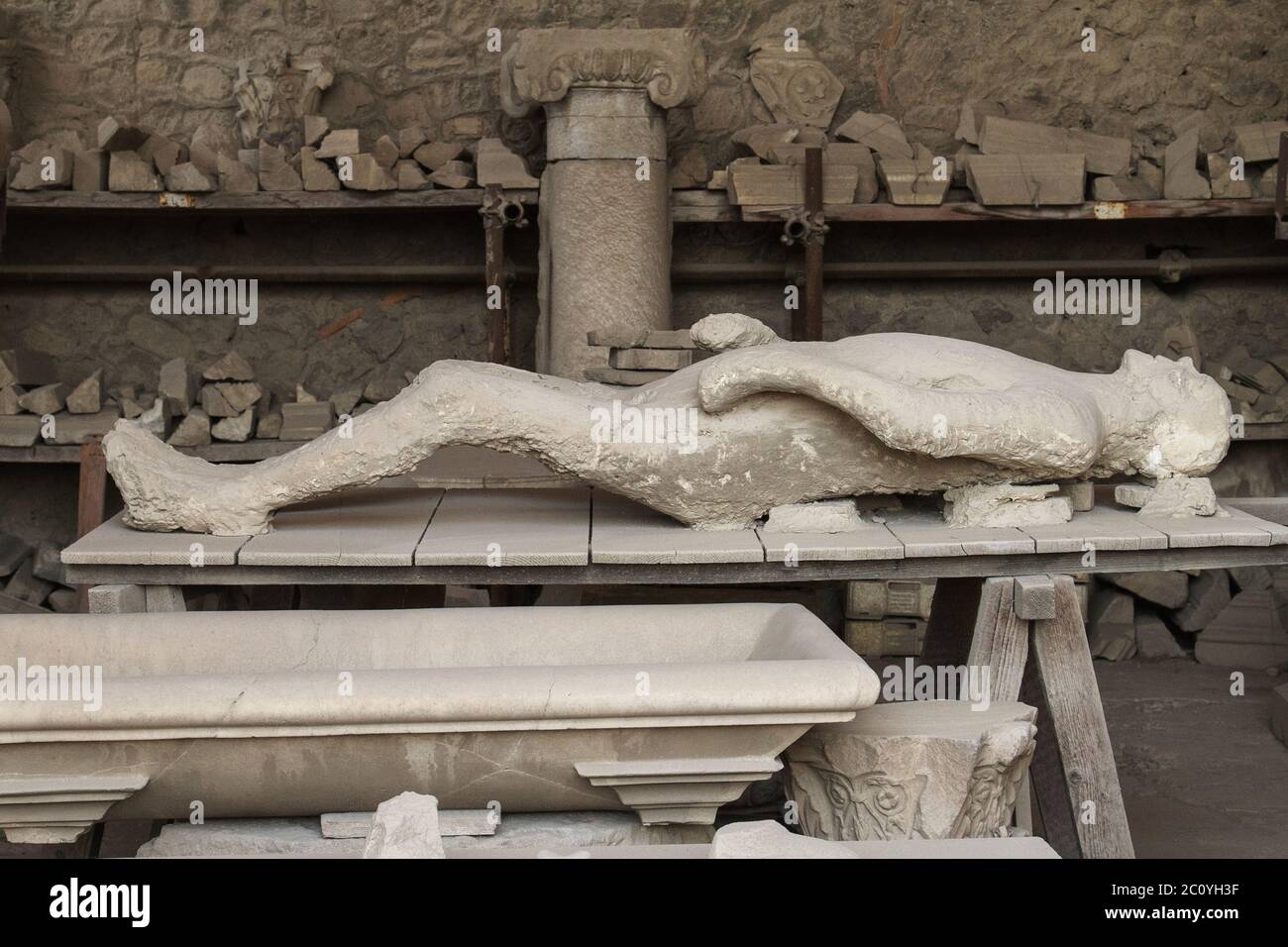 Human victim body cast from Pompeii Stock Photo
