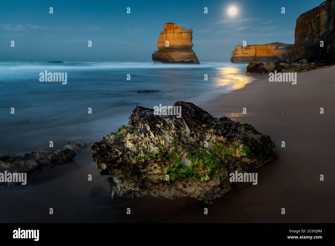 Day is dawning after a full moon night at the famous Great Ocean Road. Stock Photo