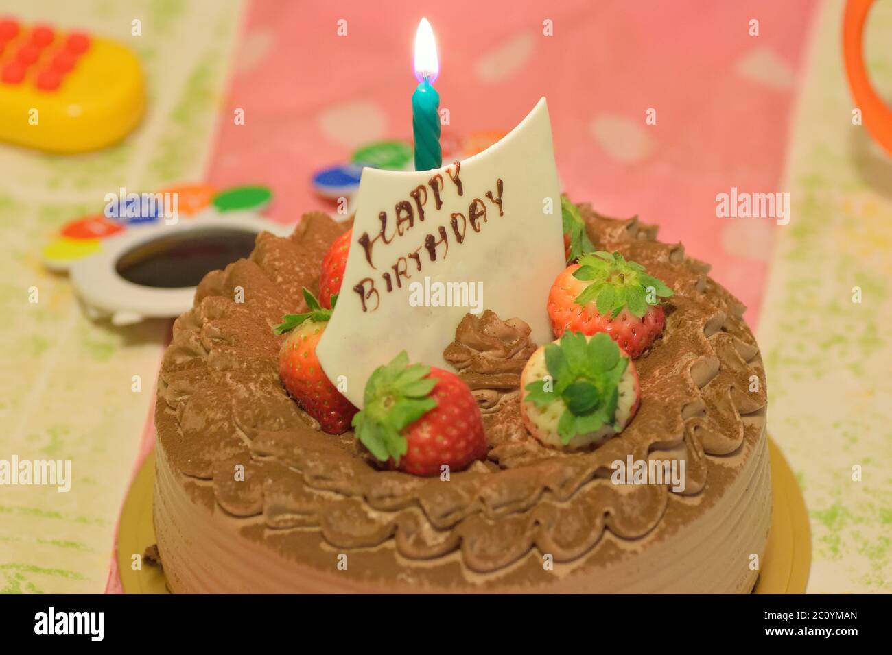 Background Birthday Cake with burning candles Stock Photo - Alamy