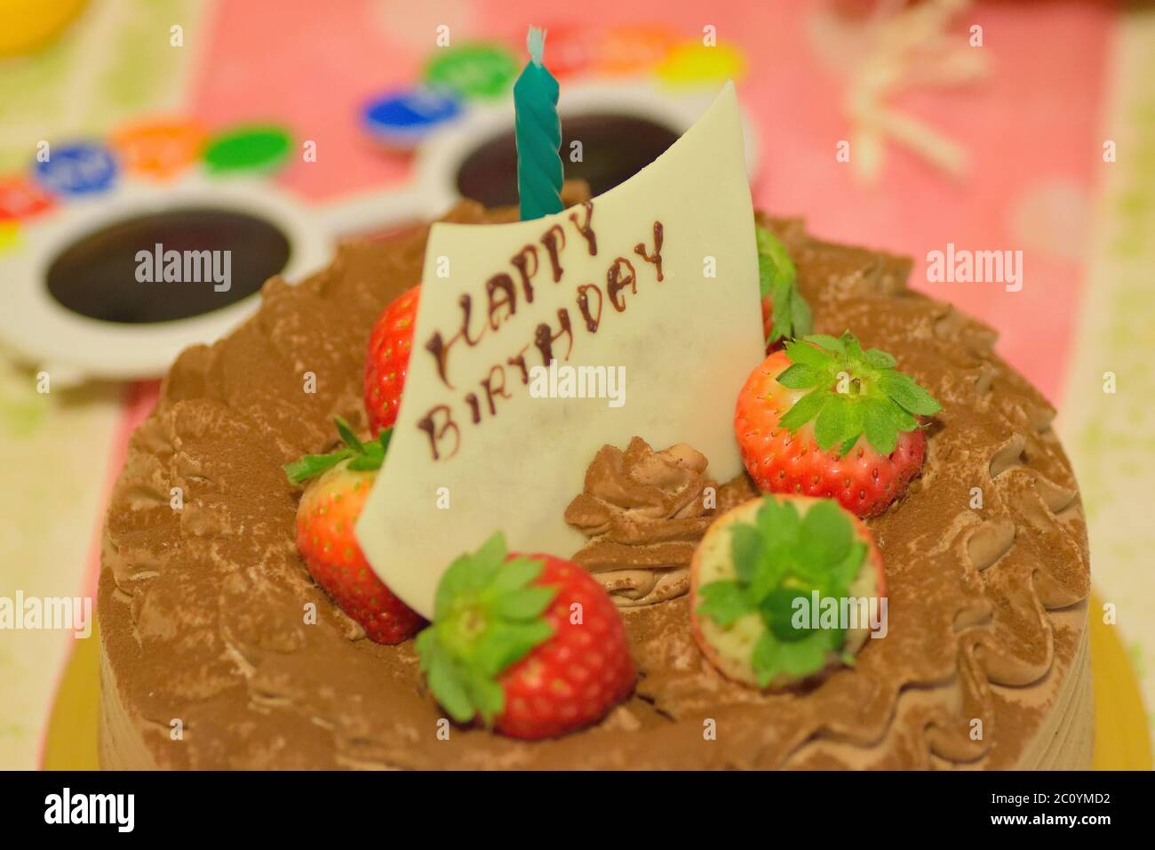 Background Birthday Cake with burning candles Stock Photo - Alamy