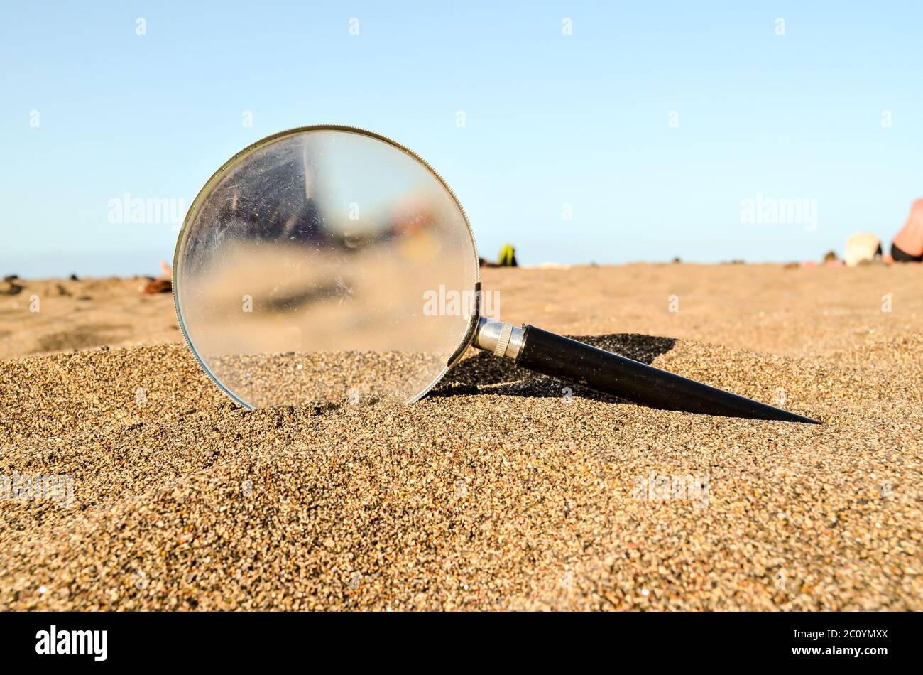 Magnify Glass On The Sand Beach Stock Photo Alamy