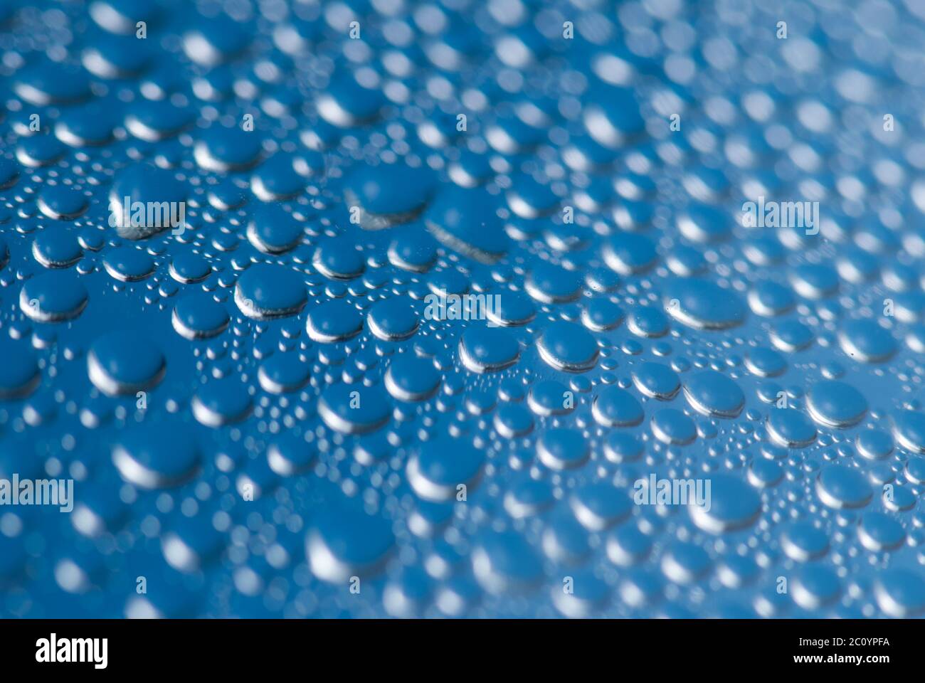 close-up of water drops on the blue background Stock Photo - Alamy