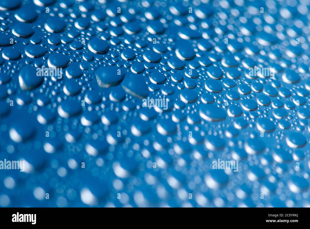 close-up of water drops on the blue background Stock Photo - Alamy