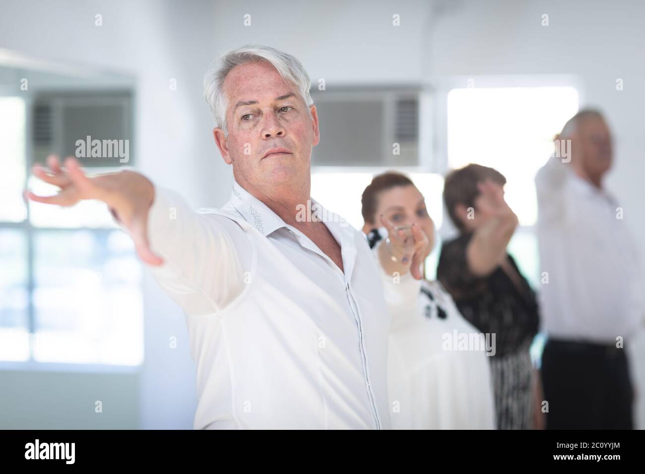 Caucasian senior couples ballroom dancing Stock Photo