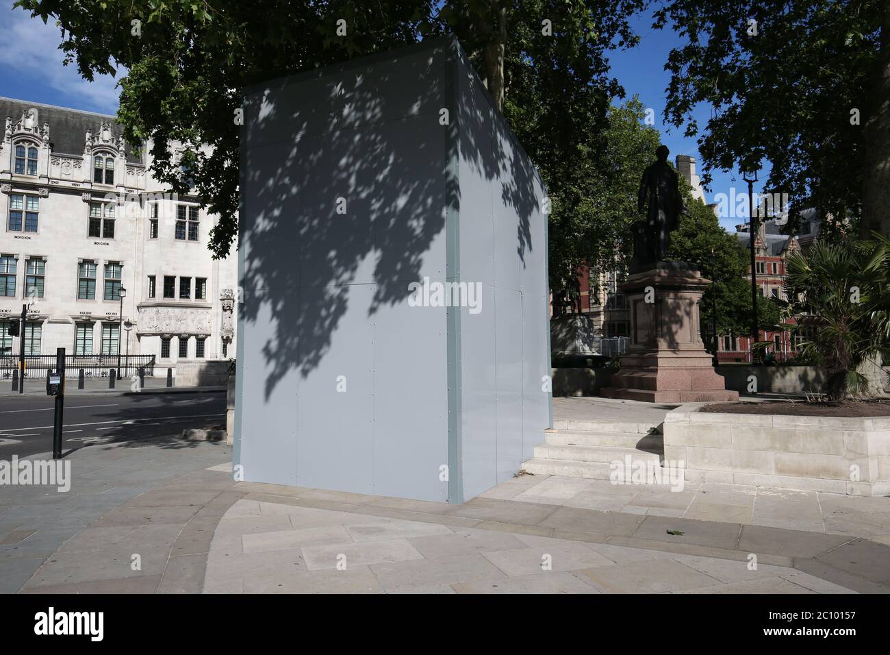 A boarded up Nelson Mandela statue on Parliament Square, London before a possible protest by the Democratic Football Lads Alliance against a Black Lives Matter protest. Stock Photo