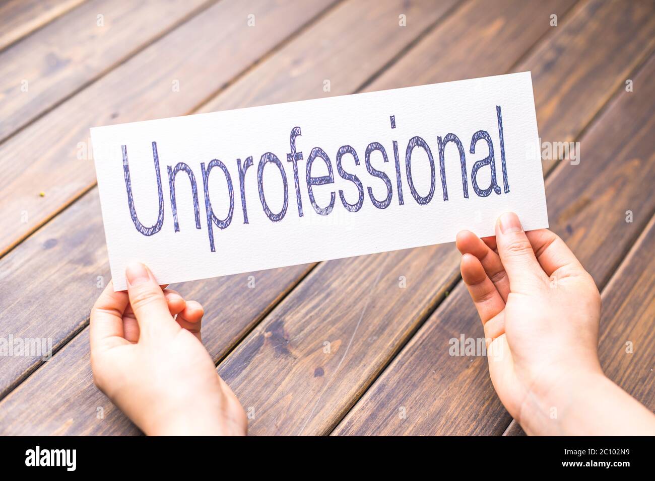 Unprofessional To Professional On Paper With Wooden Table Stock Photo Alamy Unprofessional To Professional On Paper With Wooden Table Stock Photo Alamy