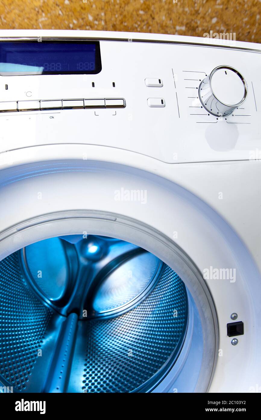 washing machine - a close up of the display, the manhole and a choice of programs Stock Photo