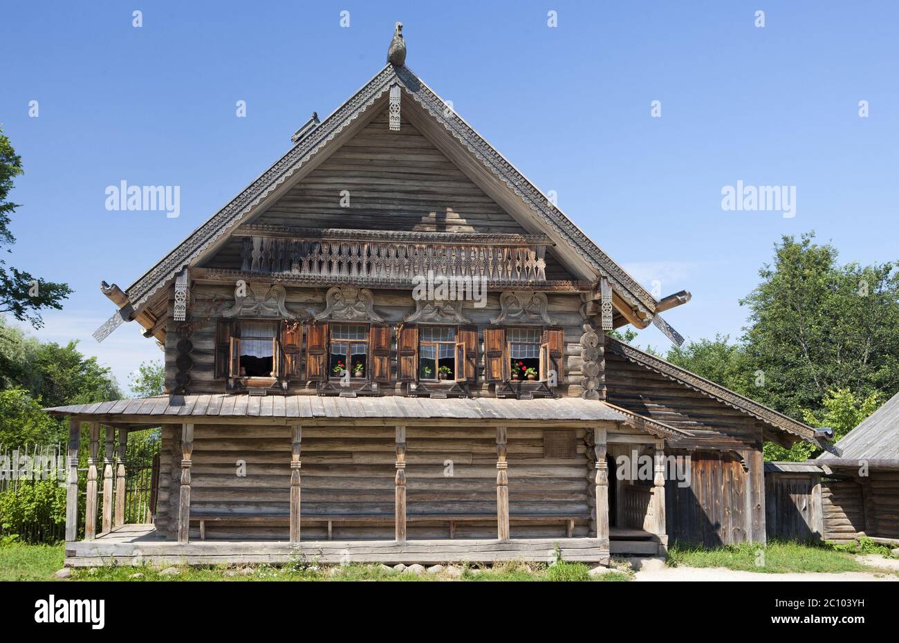 ancient log hut on a forest glade. Russia Stock Photo
