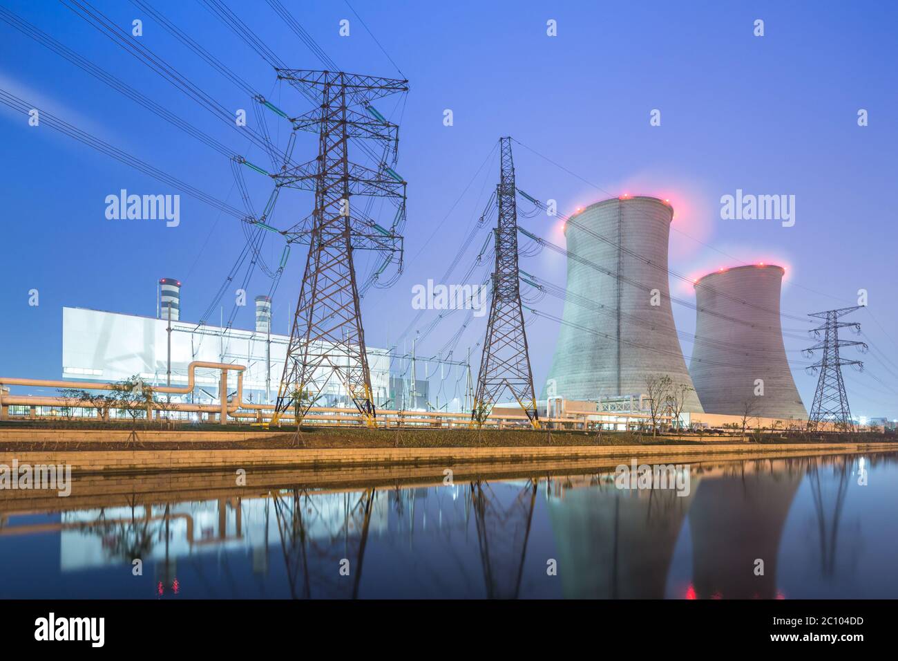 modern factory near river in blue sky at dawn Stock Photo - Alamy