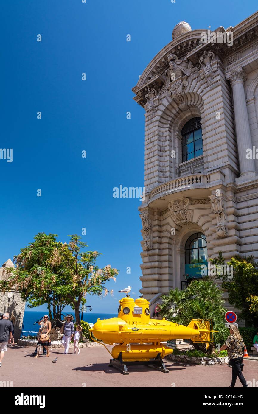 Monaco-Ville, Monaco - June 13, 2019 : Tourists visiting the oceanographic Institute museum in Principality of Monaco, with a yellow submarine. Stock Photo