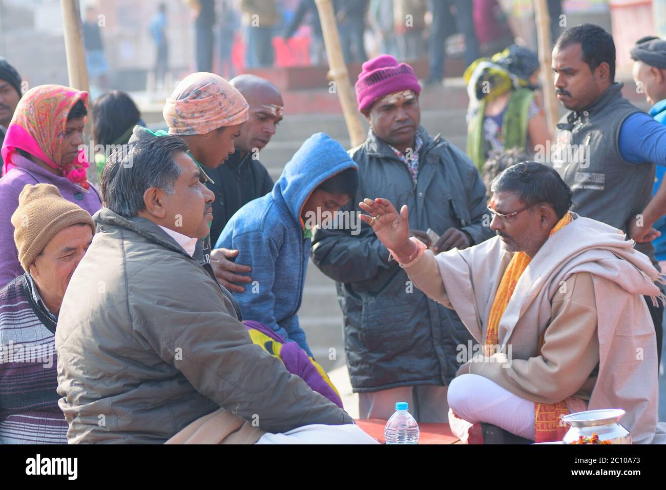 Hindu priest performing religious rituals at Ganges river bank in ...