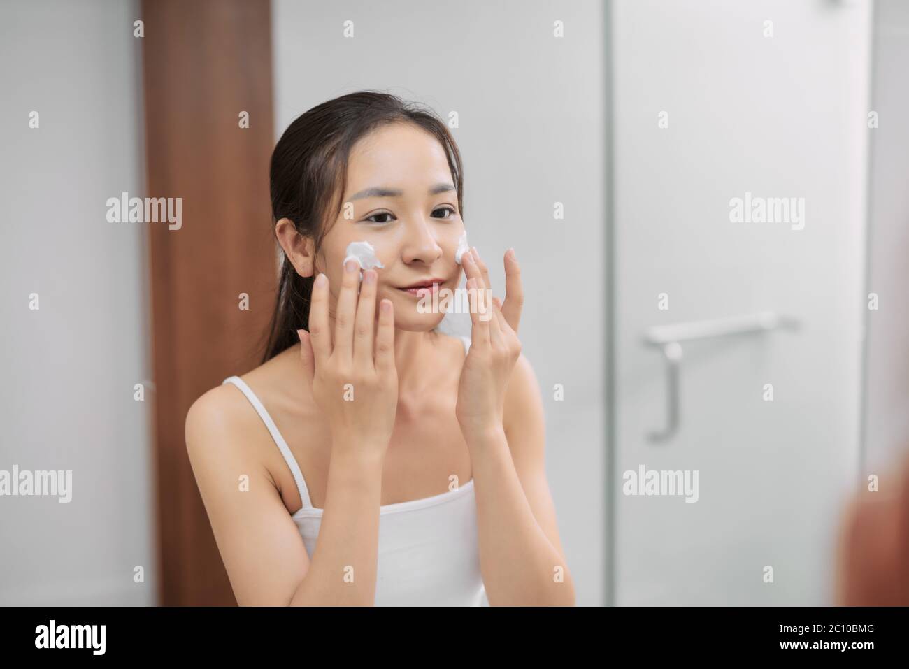 Woman happy cleanses the skin hi-res stock photography and images - Alamy