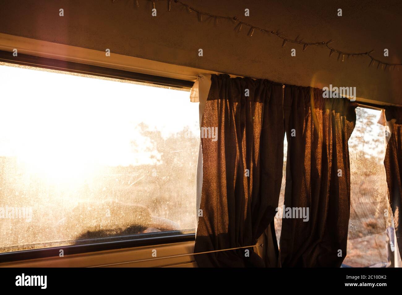 Looking out of a Campervan in the Australian Outback at Sunrise Stock Photo